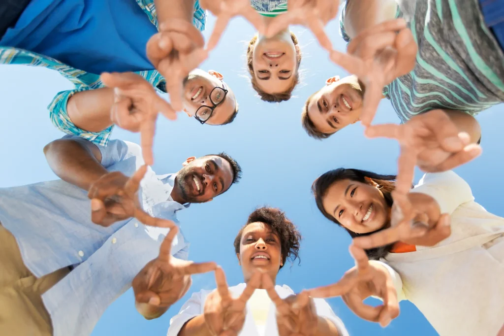 group of happy smiling friends